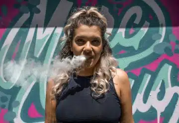 smoking woman in black halter top