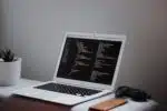turned on MacBook Air on desk
